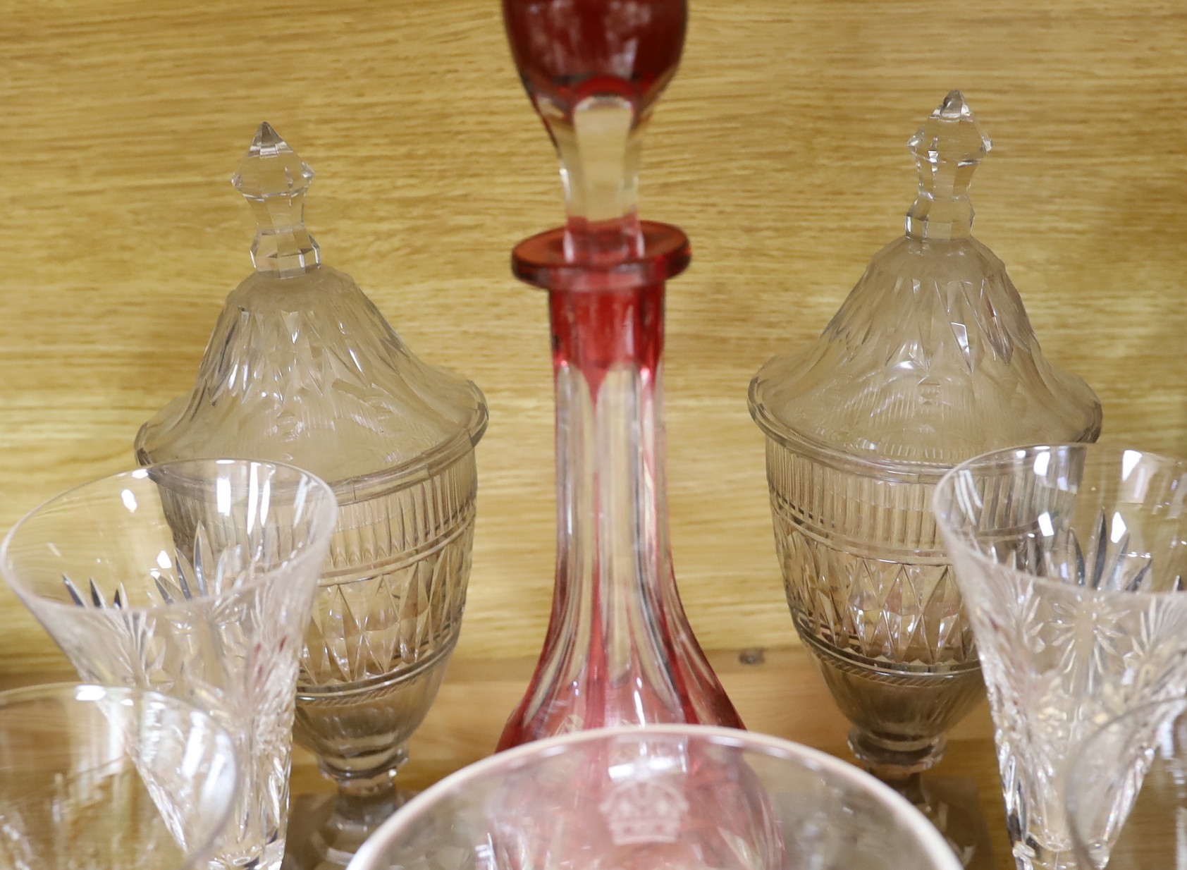 A pair of George III glass sweetmeat jars and covers, 31cm, a pair of silver-mounted tankards, Royal commemorative glassware, etc.